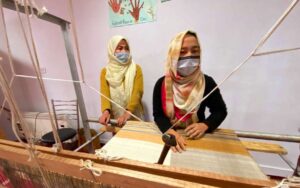 Women artisans from Ladakh making Pashmina clothing