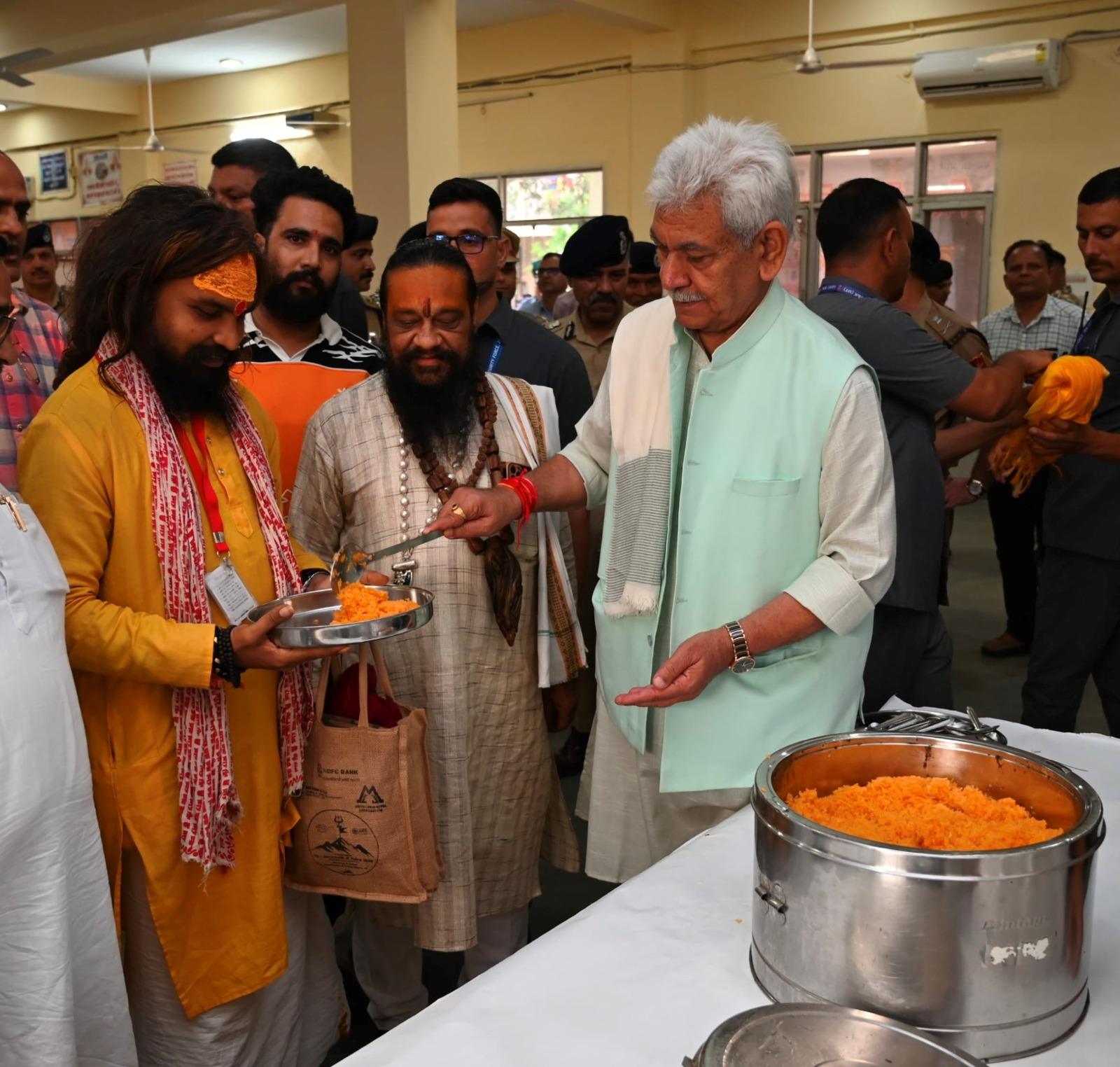 LG Sinha interacts with Amarnath pilgrims in Yatri Niwas