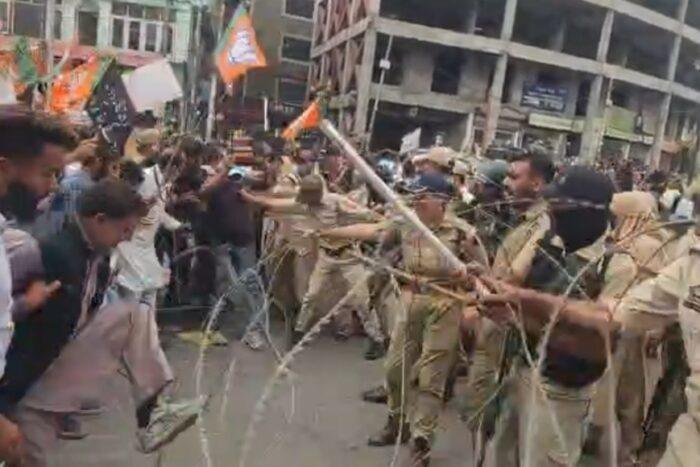 BJP, NC lock horns on Srinagar streets; Police halt rival marches